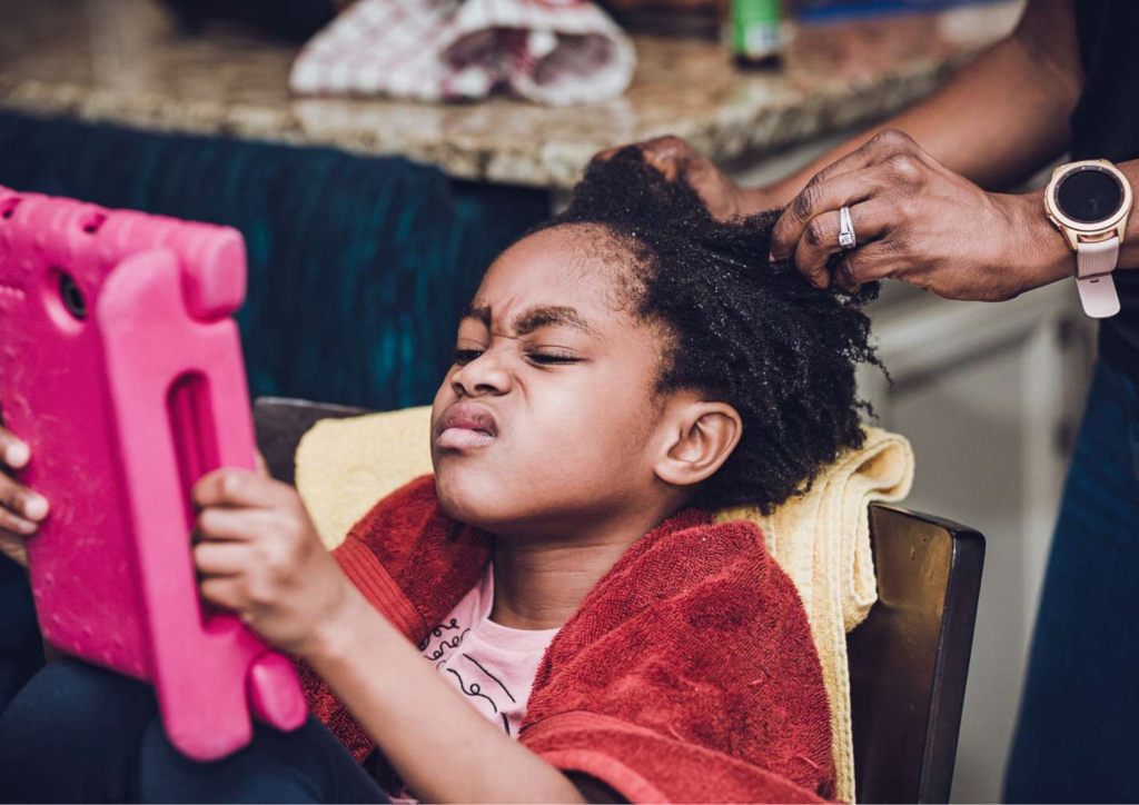 Detangling children's hair using the right amount of moiisture and conditioner 