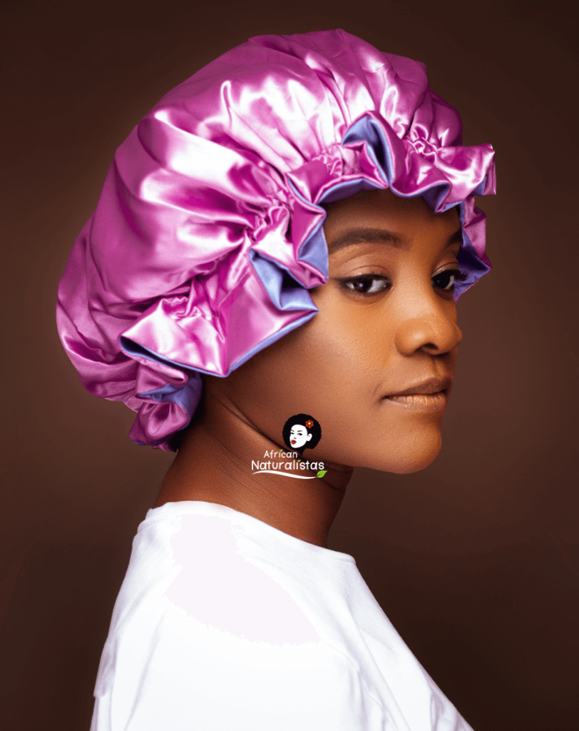 African Naturalistas Model wearing a Reversible Satin Bonnet 